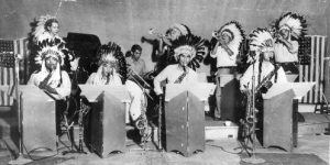 Black and white photo of the Nezpercian musicians.