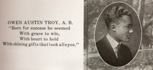 Troy's side profile with quotation.