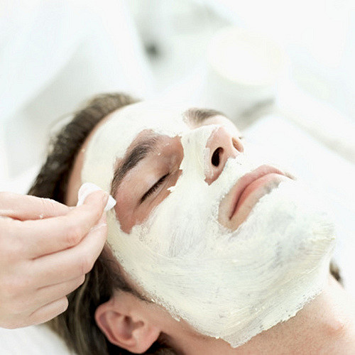 close-up of a man getting a facial